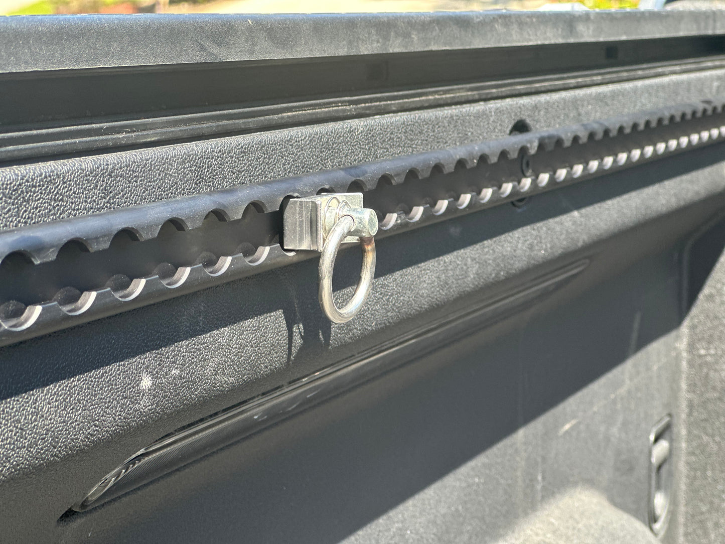 R1T bed L-Track system