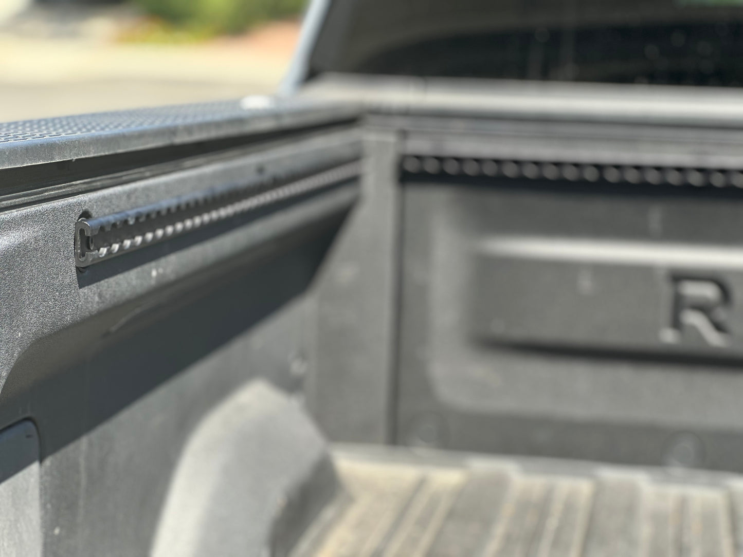 R1T bed L-Track system